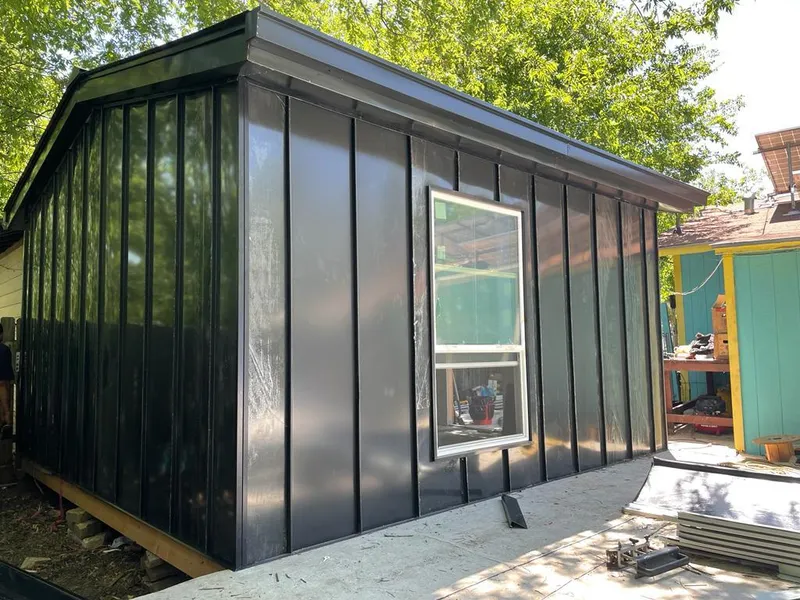 Black standing seam metal wall panels for Roof Inspection in Candler-McAfee