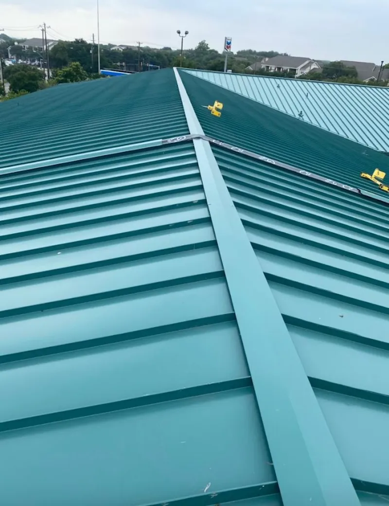 Green commercial metal roof ridge and valley for Metal Roof Repair in Candler-McAfee